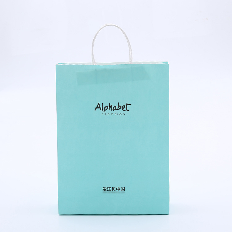 厂家批发牛皮纸手提袋 白卡纸包装礼品袋 供应印刷服装袋通用袋子