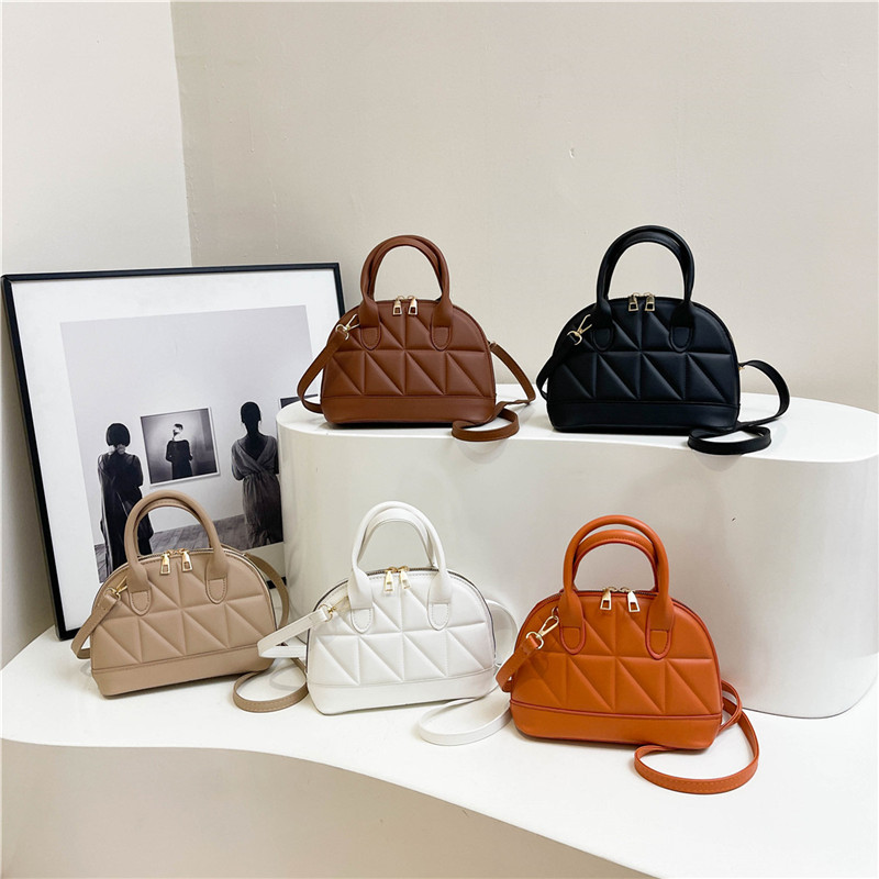 Bolso de hombro popular de este año Bolso de mano en relieve de hilo bordado de moda 2025 primavera nuevo bolso de mensajero de moda bolso femenino