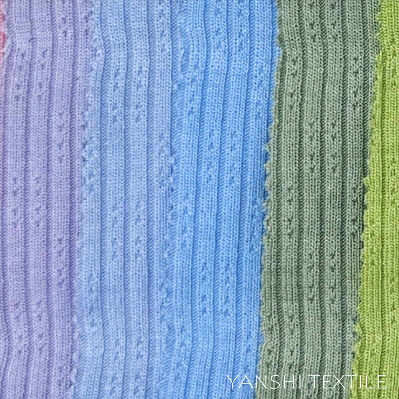 厂家直销现货  YG993 花式坑条针织布 280克女装裙子玩具公仔布