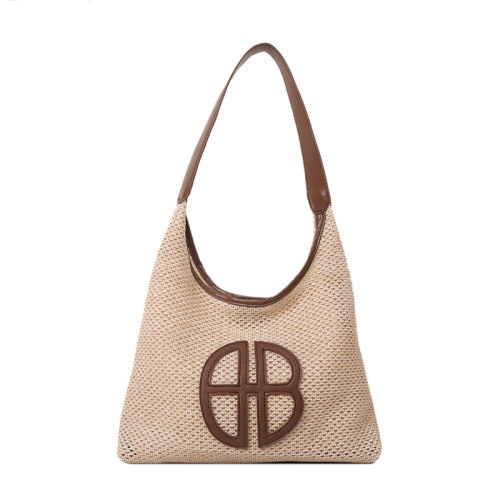 Niche hollow design bag for women 2024 new fashion straw shoulder bag versatile armpit woven tote bag