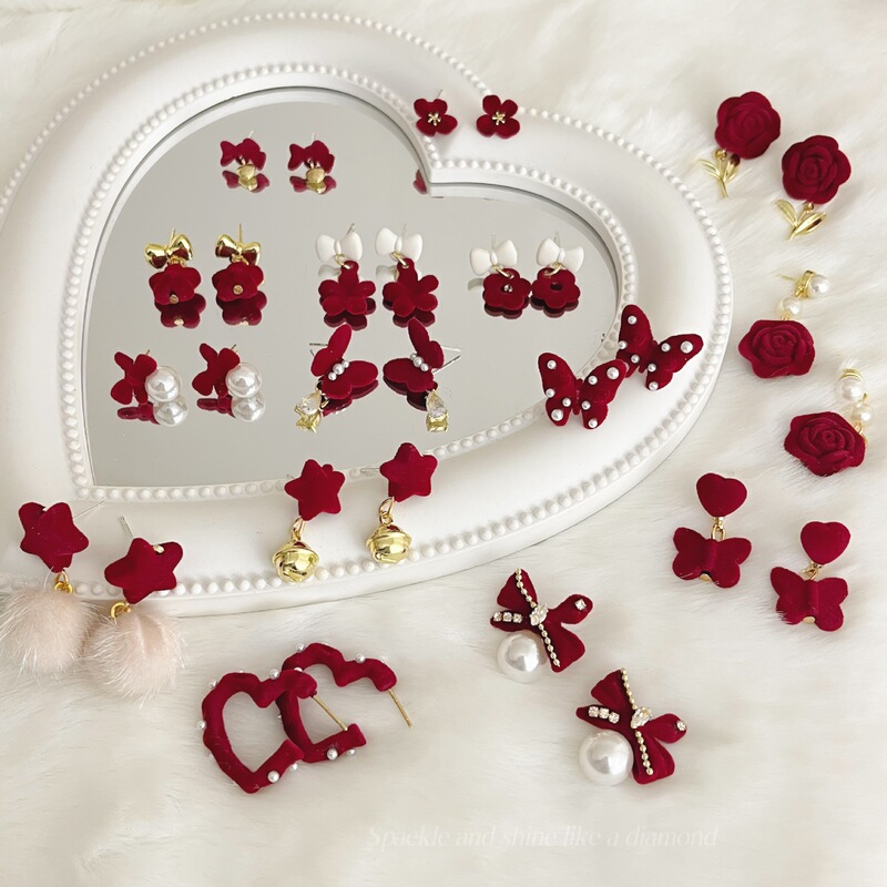 Autumn and Winter red flocking Camellia stud earrings butterfly flower New Year earrings female sweet velvet temperament earrings wholesale