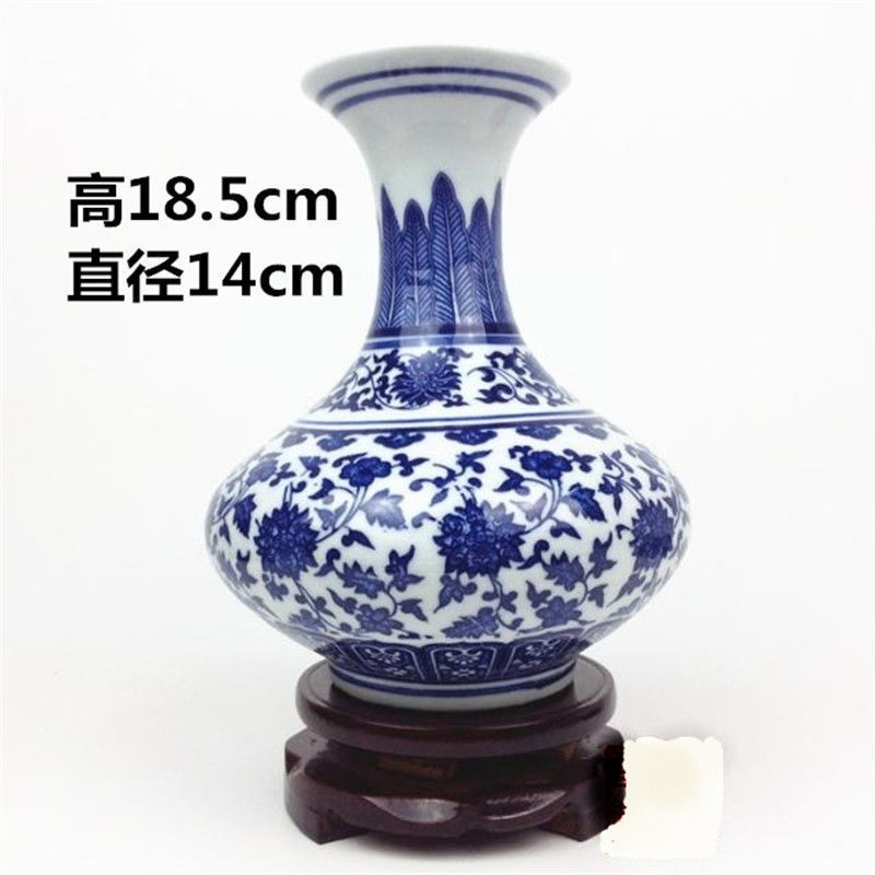 베이스가 없는 중간 파란색과 흰색 플랫 벨리 병♢