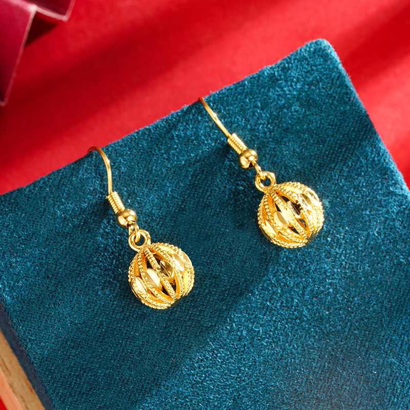 Bola hueca gancho de oreja de moda para mujer pendientes de todo fósforo pendientes de bola redonda luz nicho de lujo de alto grado hueco al por mayor Vietnam arena oro