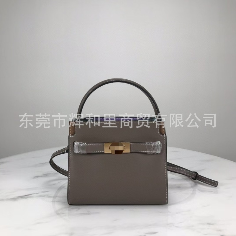 新しいTBの本革の女性のカバンのファッション的なミニのケリーの金のれんがのトートの手提げの片の肩は斜めに包んで元の単の高版をまたがります。|undefined