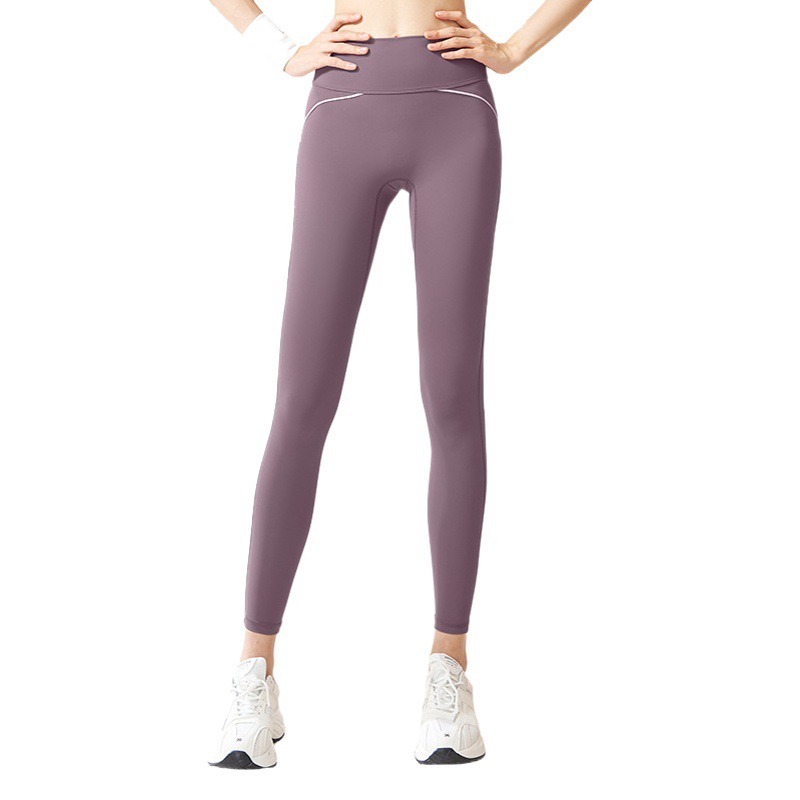 Pantalones de yoga Juyitang con sensación de línea sin líneas extendidas, pantalones deportivos ajustados de cintura alta con sensación desnuda de alta elasticidad