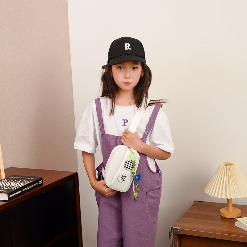 Moda coreana popular para niños y niñas bolso de pecho letras extranjeras mini bolso de bebé bolso de cintura casual al aire libre para niños