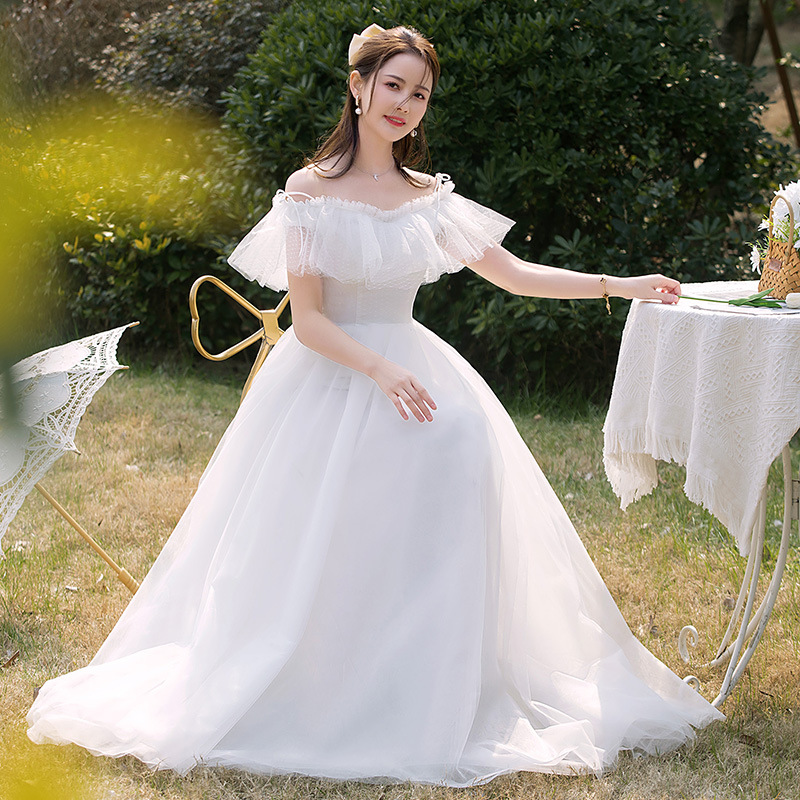 Licht 2025 Nieuwe Bruid Off-shoulder Bosstijl Eenvoudige Franse Witte Prinses Super Fee Buiten Reisfotografie_voghion.com