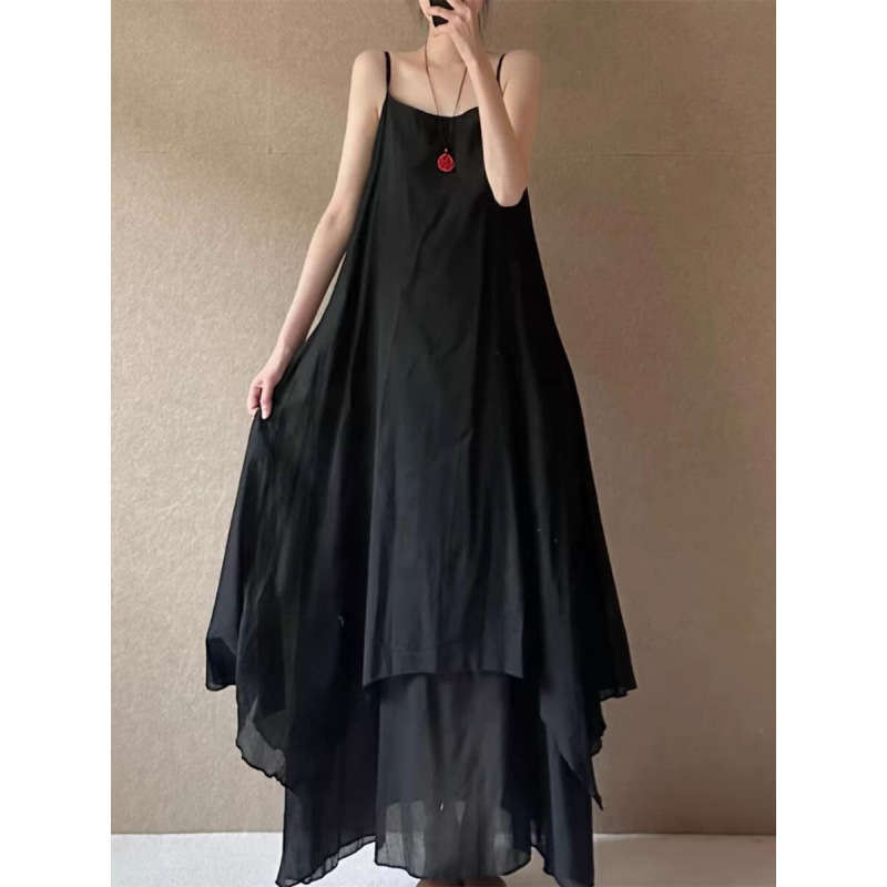 Minimalist long camisole dress with irregular curved hem and double-layered flowing skirt Minimalist long camisole dress with irregular curved hem and double-layered flowing skirt