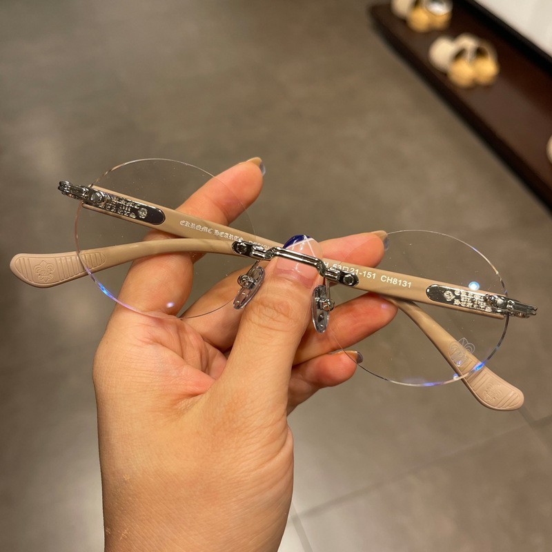 新しいレトロな穴あきフレームレスクロスターグラスフレーム、男性と女性向けのパーソナライズされた超軽量ファッショナブルな多用途フラットメガネ|undefined