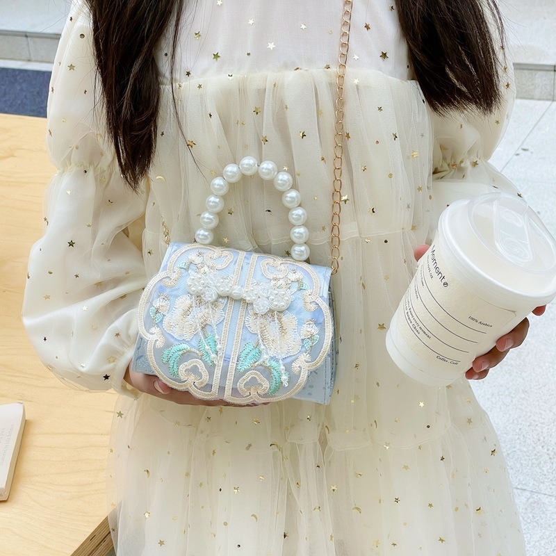 2025 nuevo estilo nacional bolso infantil princesa bolso de perla nueva niña china accesorios cadena bolso de mochila