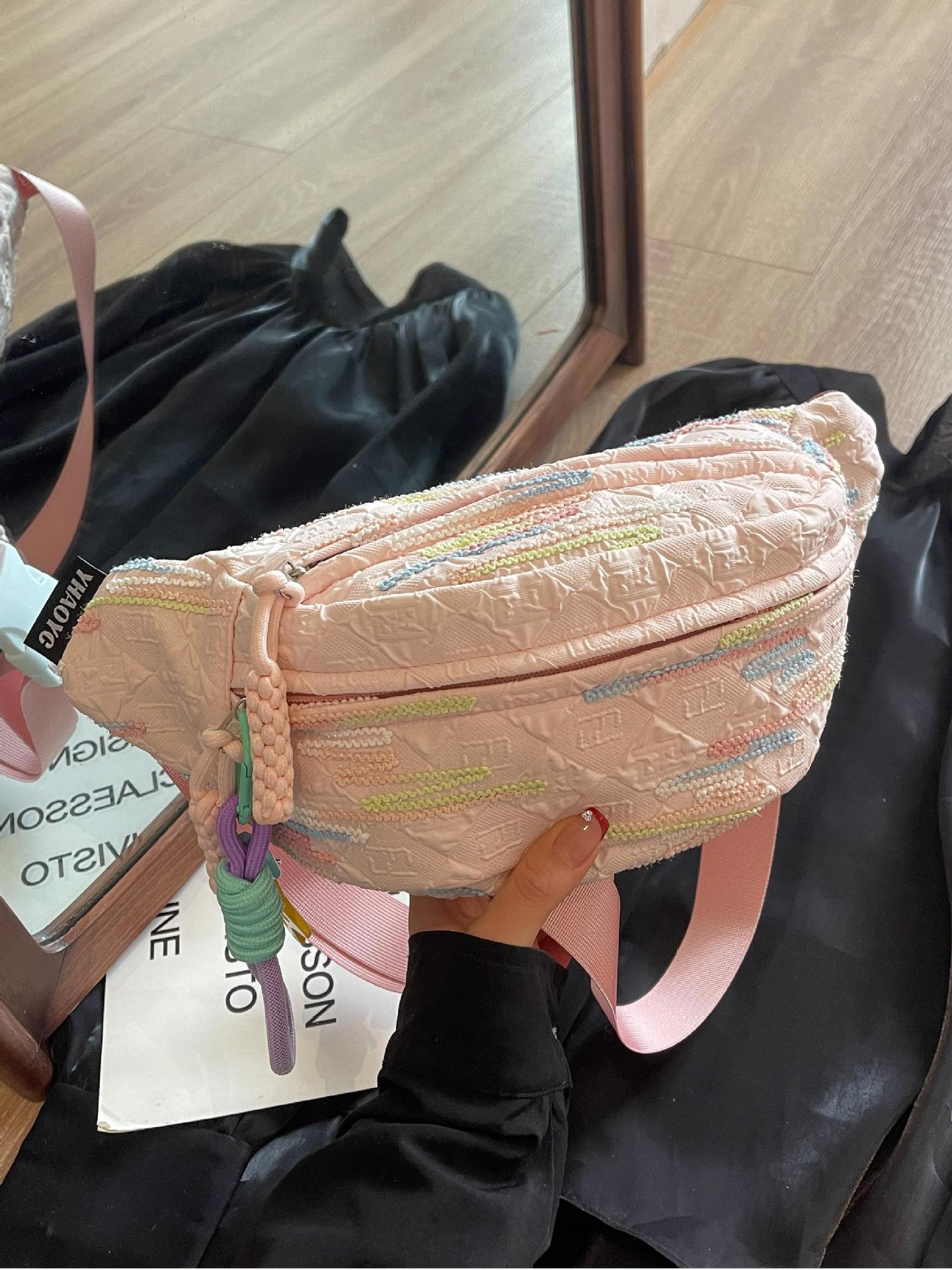 Versión coreana del bolso de mensajero de moda casual ins para mujer 2025 nuevo bolso de bolsillo de todo fósforo de viaje al aire libre bolso de pecho para mujer