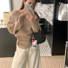 辣妹斜领长袖针织衫女秋冬宽松设计感小众不规则软糯毛衣内搭上衣