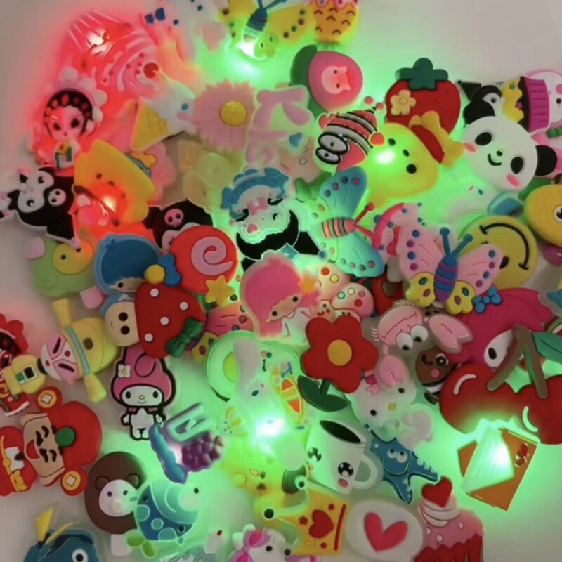 Luminous hole shoes shoes accessories LED flashing light electronic shoe flower shoe buckle garden shoes vibrating light shoe flower buckle manufacturers