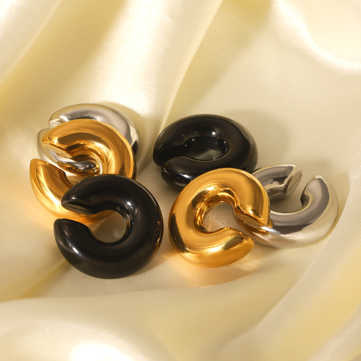 Pendientes de pinzas de oreja huecas de acero inoxidable clásico de moda europea y americana