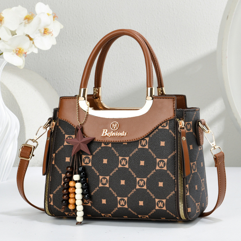 Bolsas de mano de moda casuales con estrellas colgantes, bolsas de hombro, bolsas de transporte aéreo, bolsas de mujer transfronterizas