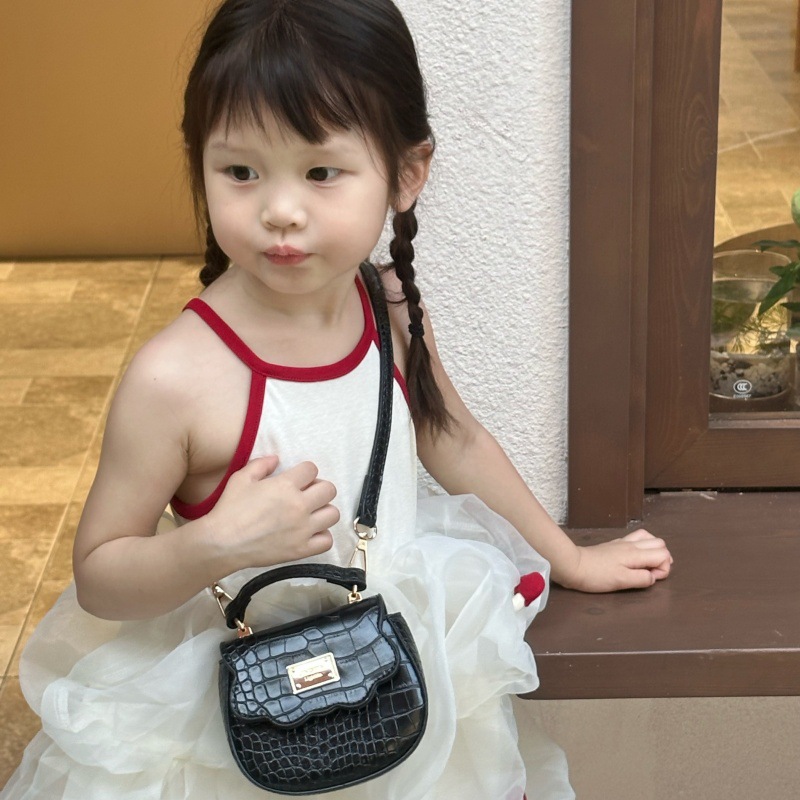 Bolso de hombro para niña de color sólido simple mini bolso de bebé lindo 2025 nuevo bolso de mensajero para niños de comercio exterior marea