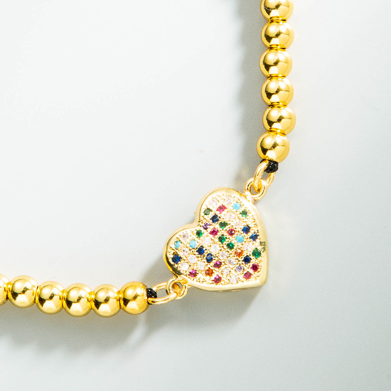 Fashion Creative Micro-inlaid Colored Zircon Heart Black String Copper Bracelet Wholesale Nihaojewelry display picture 4