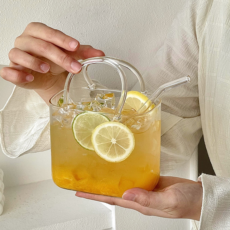 Bolso de vidrio en línea taza de té de frutas de verano transparente creativa extraña de alto valor de la cara taza de cóctel de jugo de fruta