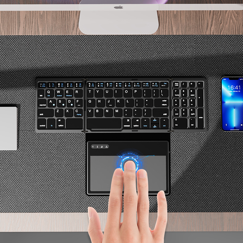 Qianye teclado inalámbrico ultrafino de cuatro botones plegable con panel táctil grande tableta Bluetooth silencioso mini ligero