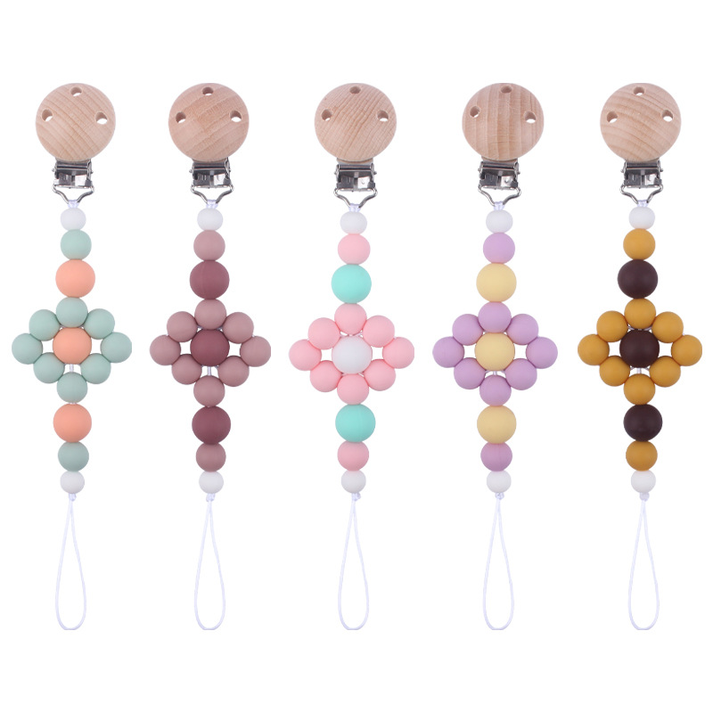 Nuevo bebé suministros calmante clip de chupete de haya creativo bebé mordedura de silicona Cadena de chupete molar cadena anti-gota