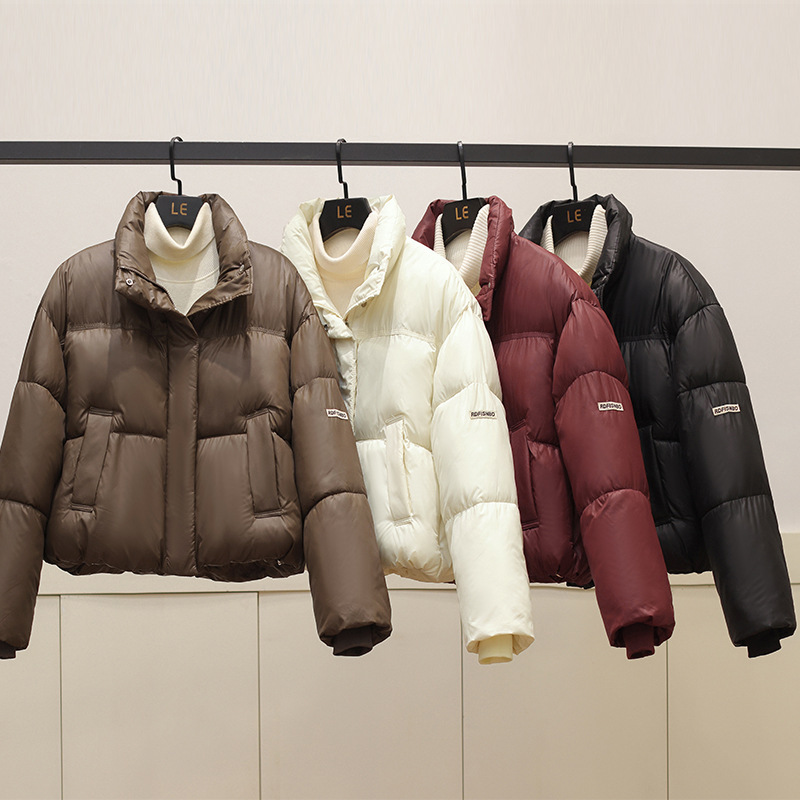 Ropa de algodón coreana para mujeres gruesas abrigo corto de invierno 2025 nuevo estilo de estilo de cuello vertical chaqueta de algodón estilo occidental ropa de pan