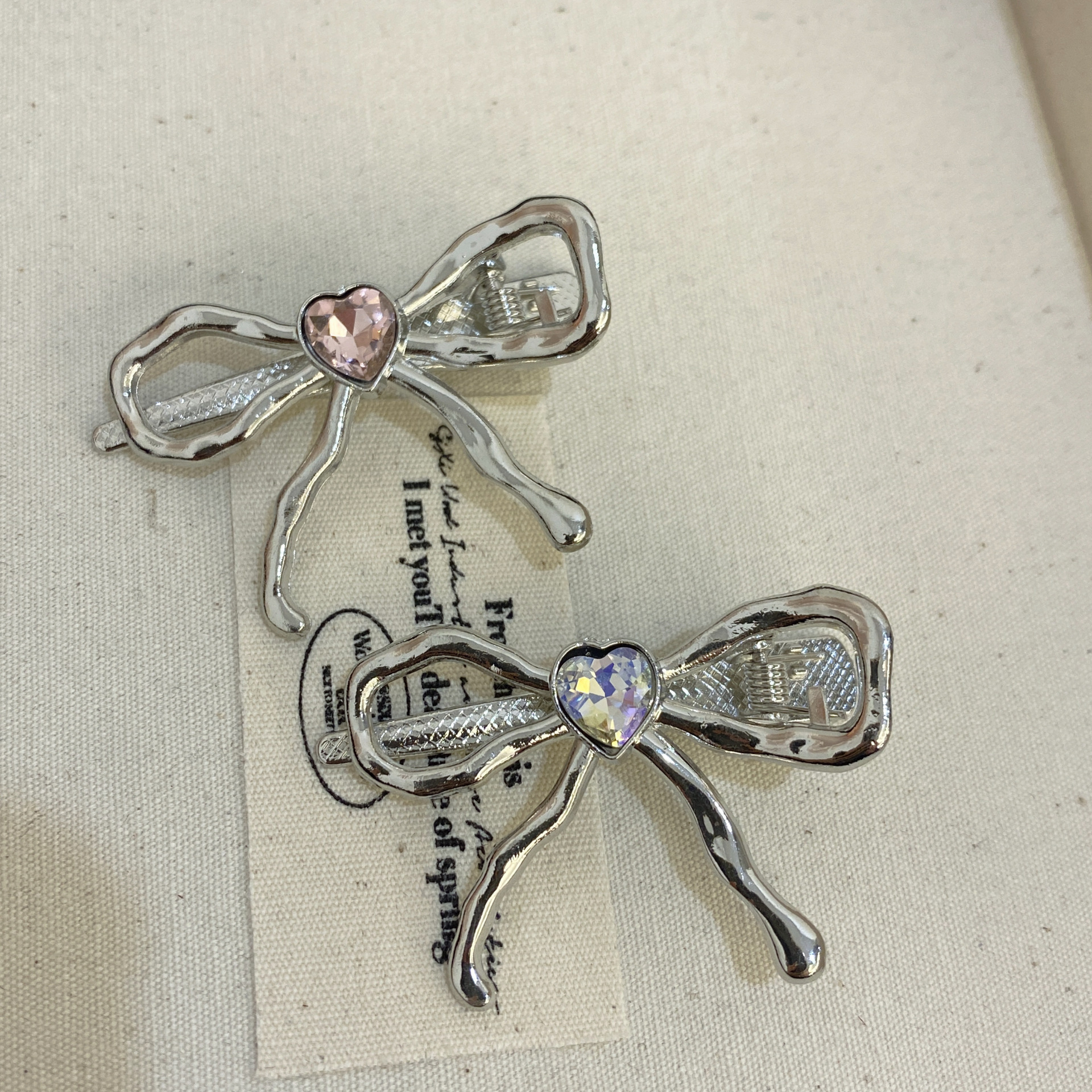 Fermaglio a fiocco in argento con strass per capelli da donna_voghion.com
