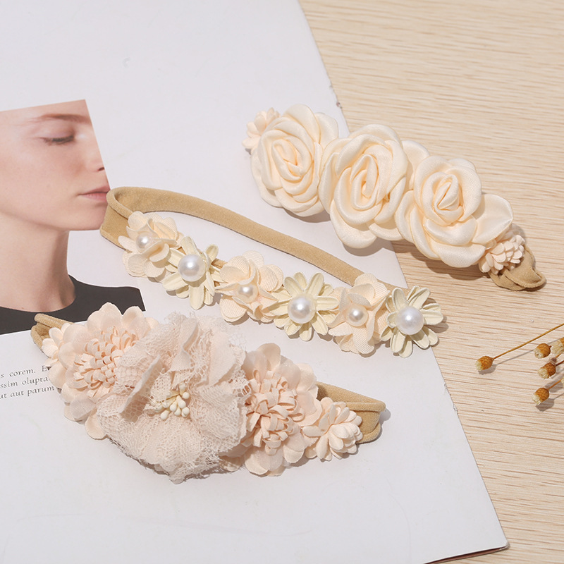 Europa y América del todo-fósforo de los niños banda de pelo creativo simulación flor elástica banda de pelo accesorios para el cabello al por mayor Linda pequeña flor combinación