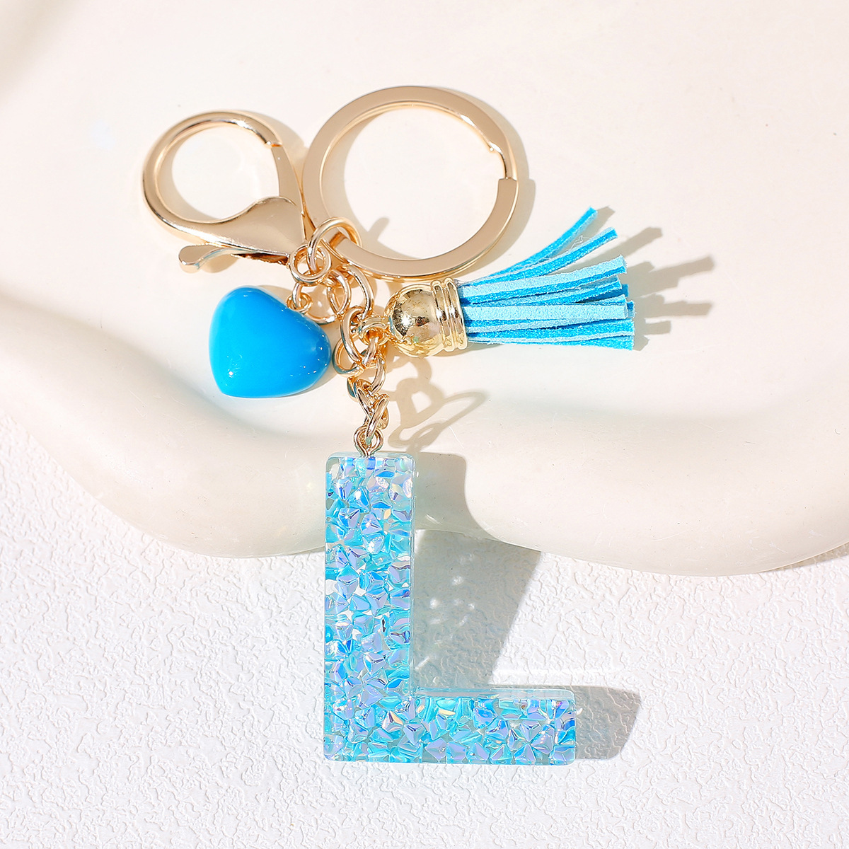 Nuevos productos azules de amor con frascos de letras lindos enclavadores decoraciones europeas y americanas populares llaveros damas