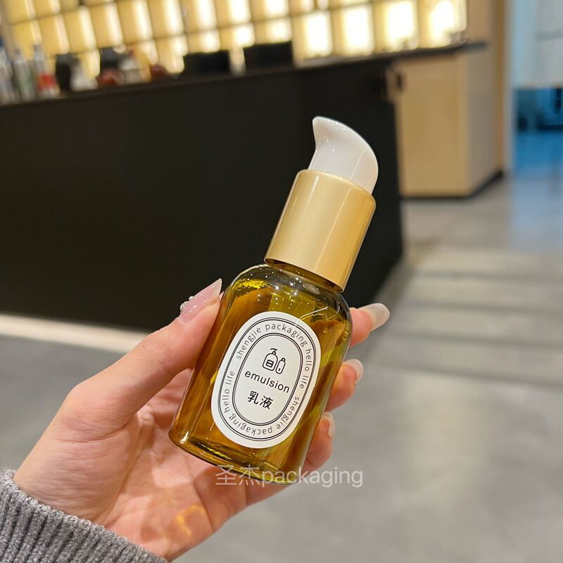 Press Type Essential Oil Bottle Left and Right Lock Thick Wall Small Gold Bottle Hair Care Essential Oil Massage Oil Facial Essence Packaging Bottle