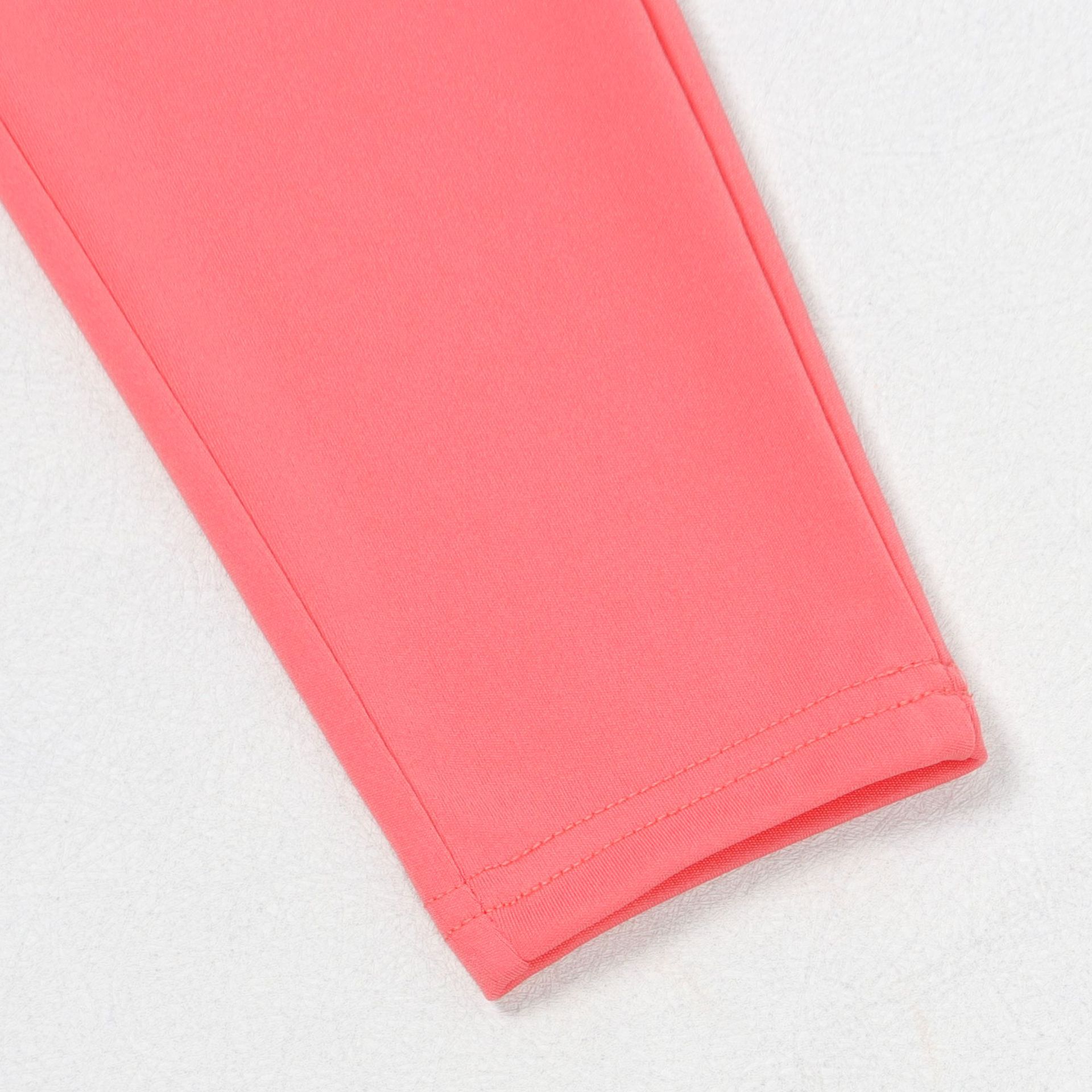 Conjunto de dos piezas de blusa y pantalón de manga larga con escote en V y cintura ajustada de color liso