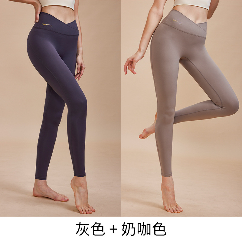 Pantalones de yoga con tacto suave para mujer, estilo primavera, pantalones deportivos profesionales de alta gama, ajustados, de cintura alta, elásticos, de secado rápido, para fitness.