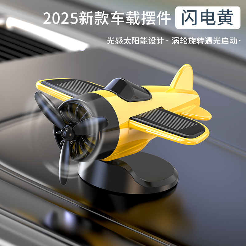 Nuevo adorno creativo de avión giratorio con energía solar para decoración del salpicadero del coche, suministros automotrices de alta gama