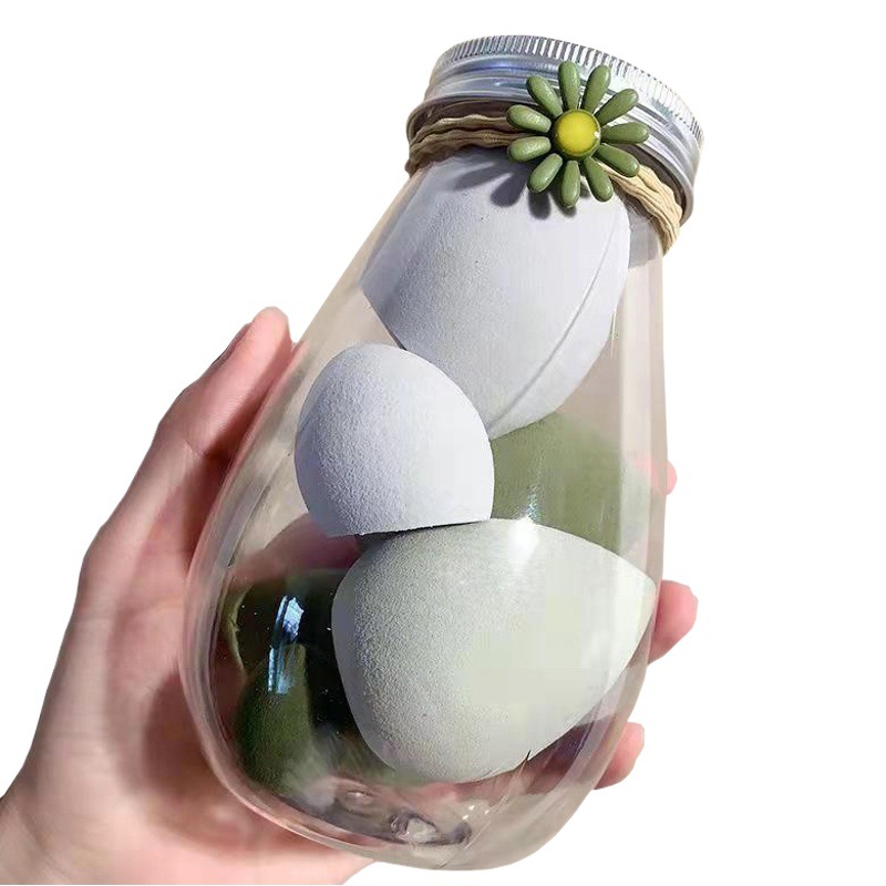 Traje de viaje portátil polvo puff PET embotellada belleza huevo súper suave embotellada mejorada esponja polvo puff leche té enlatado color