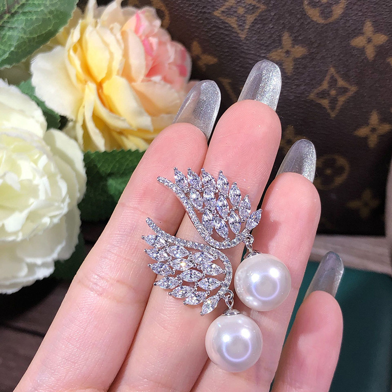 Boucles d oreilles pendantes perle ailes d ange élégantes_voghion.com