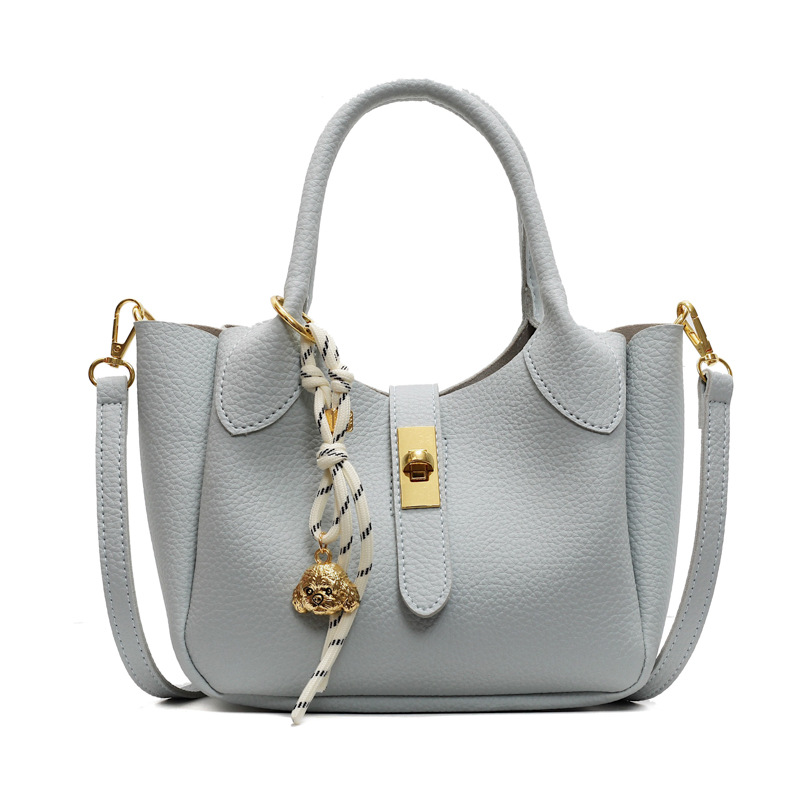 Bolso de cesta de verduras simple de comercio exterior para mujer 2025 nuevo bolso de hombro casual salvaje de moda bolso de cubo de aire extranjero