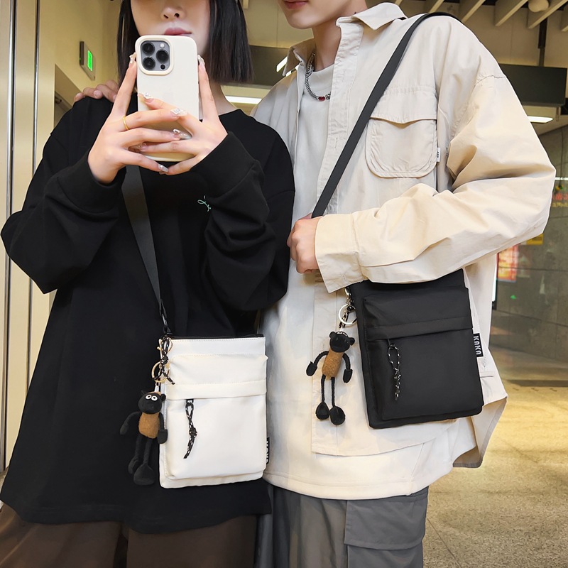 Nueva bolsa de hombro simple de estilo literario y artístico para viajar bolsos deportivos ociosos bolsos de teléfono móvil bolsos de moda transfronterizos