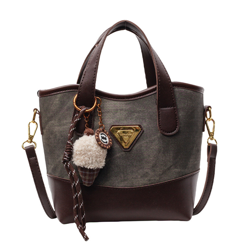 Bolso de mano de color de contraste de estilo explosivo de comercio exterior para mujer 2025 nuevo bolso de mensajero de moda salvaje bolso de cubo de ocio retro