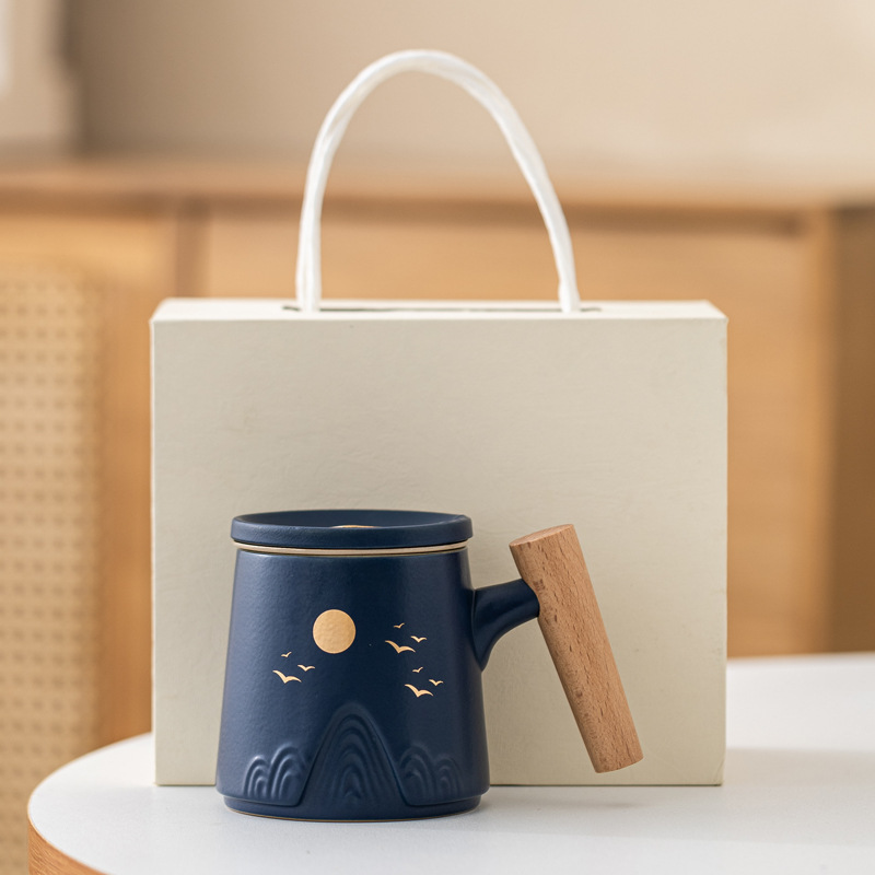 Guofeng Wenchuang marca taza de cerámica Zhoushan tres piezas juego de regalo de mano taza de calentamiento tallado comercial LOGO nombre