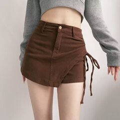 初秋の新型高腰側のひもの不規則なデニムのスカートの女性の欧米風のセクシーなギャルの大きいサイズのスカートのズボン