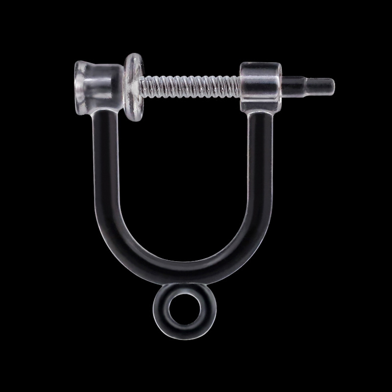 There is a hanging resin spring ear clip under the 0.75 hole on one end [without spring]