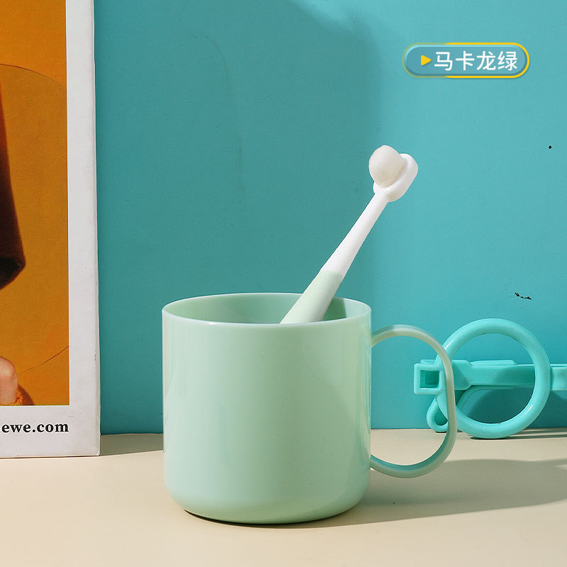 Venta al por mayor taza de enjuague bucal taza cepillo de dientes taza hogar lindo gota resistente taza de agua de dibujos animados cepillado taza de lavado