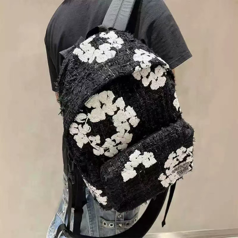 Denim Tears co., Ltd. xiaoxiangfeng Design sense wanpin embroidery mochila mochila casual mochila de computadora para hombres y mujeres