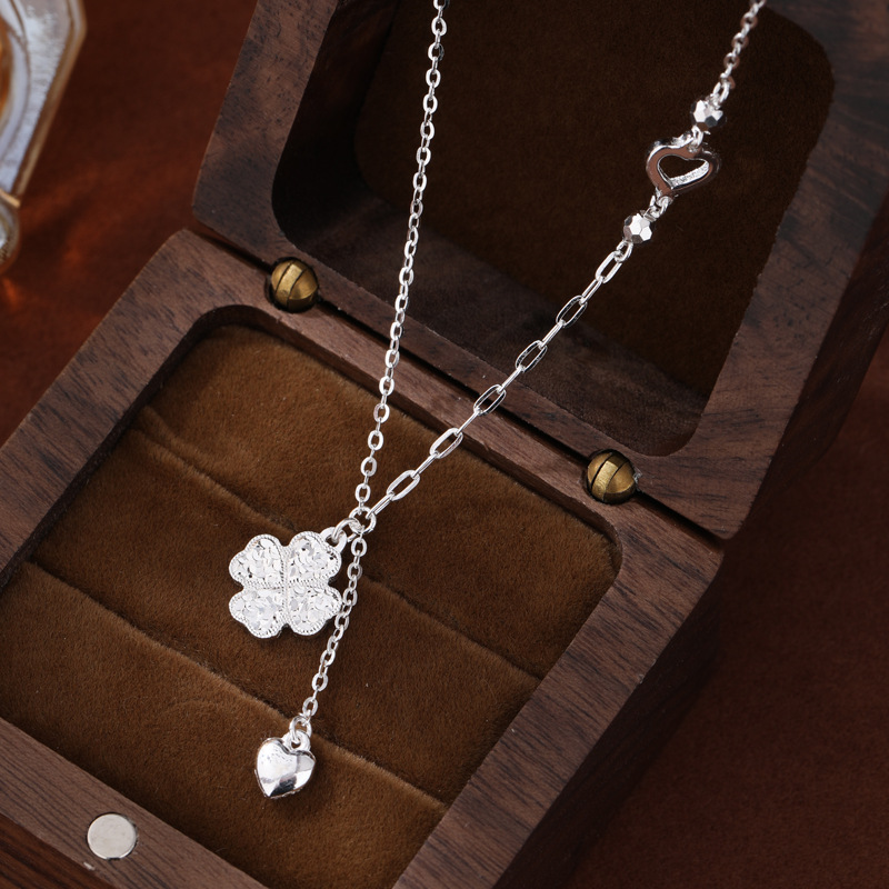 Hielo roto de hielo doble anillo cuatro hojas collar de plata 999 plata ligera lujosa alta sensación pequeña cintura colgante cadena de suéter