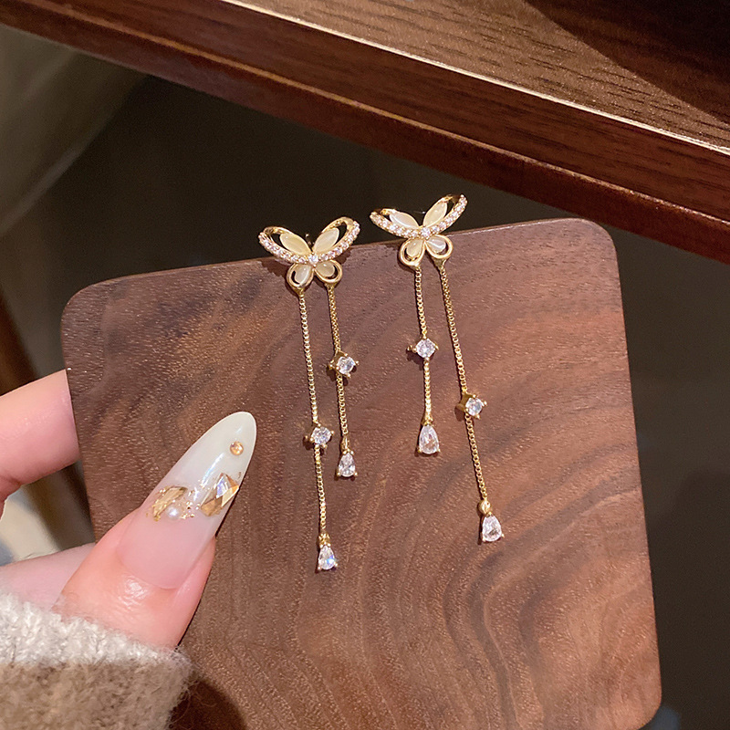 Corea del Sur explosión ultra inmortal cristal mariposa pendientes nicho femenino de alta calidad temperamento universal perla pendientes de orejas al por mayor