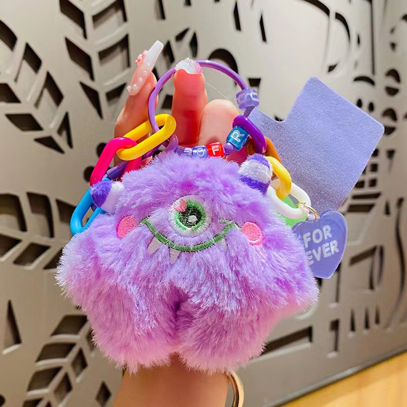 [Venta caliente] genuino de peluche monstruo coche llavero par colgante de teléfono móvil colgante bolsa colgante