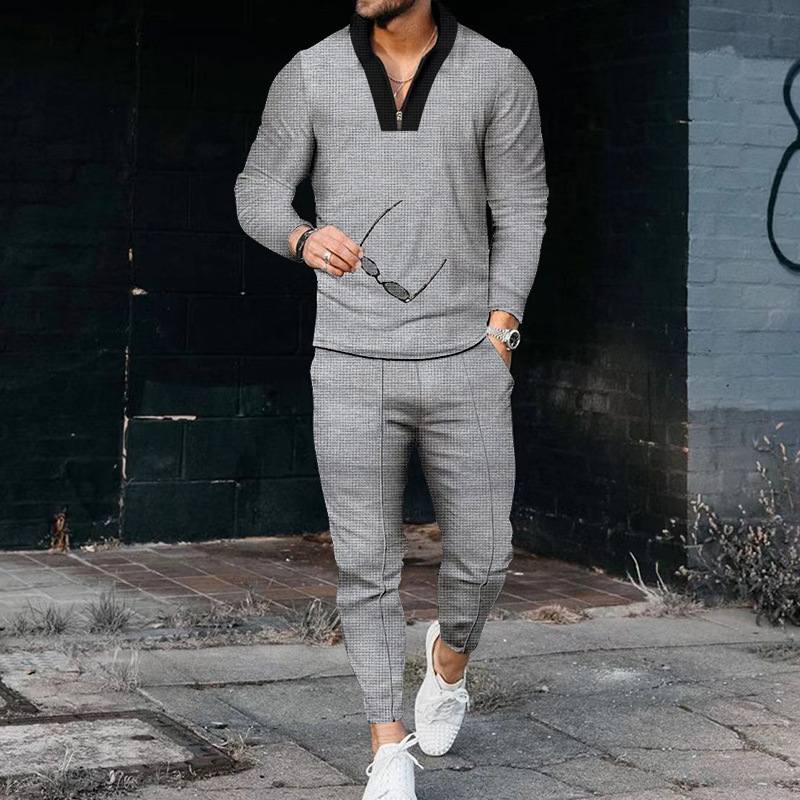 Traje de cuello alto con costuras de manga larga de gofres transfronterizos Ropa deportiva con media cremallera de moda casual de alta gama para hombres