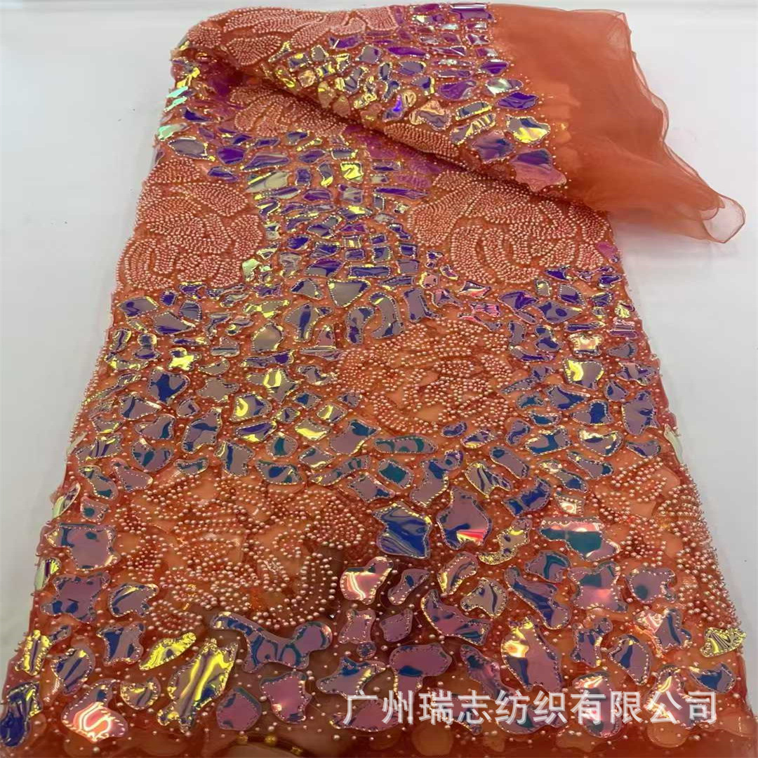 El láser de color fantasma rosas bordadas Gao Ding rendimiento ropa de moda nacional sequin bordado tela
