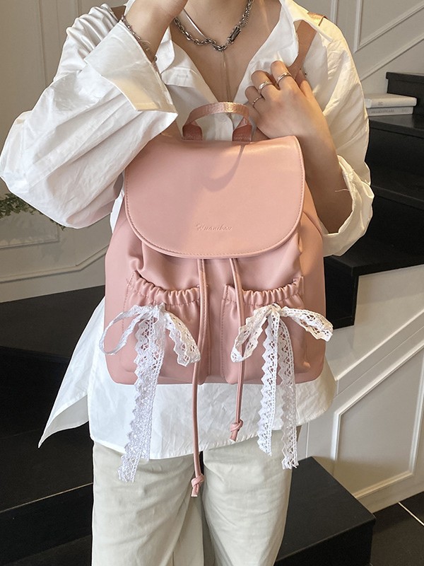 双肩包女学生书包百搭轻便通勤可爱韩版背包大容量休闲皮质蝴蝶结