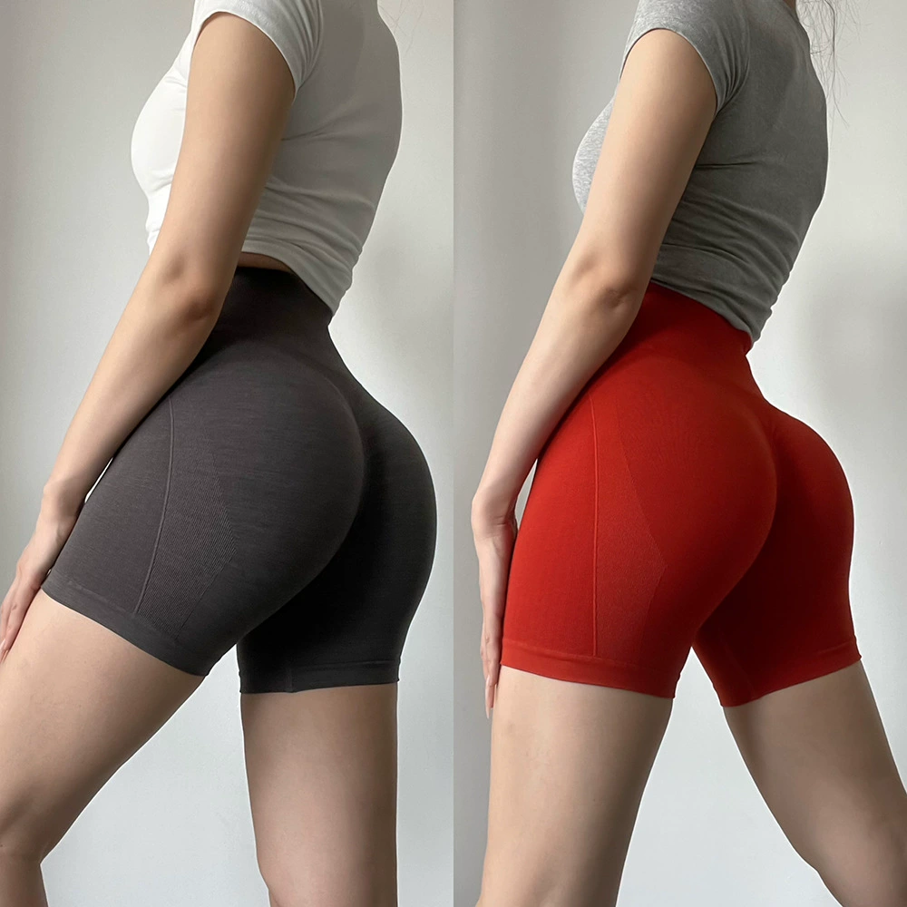 Европейские и американские высокоэластичные шорты для фитнеса, демонстрирующие бедра, спортивные трикотажные обтягивающие брюки персикового цвета, брюки для йоги для бега, впитывающие пот.