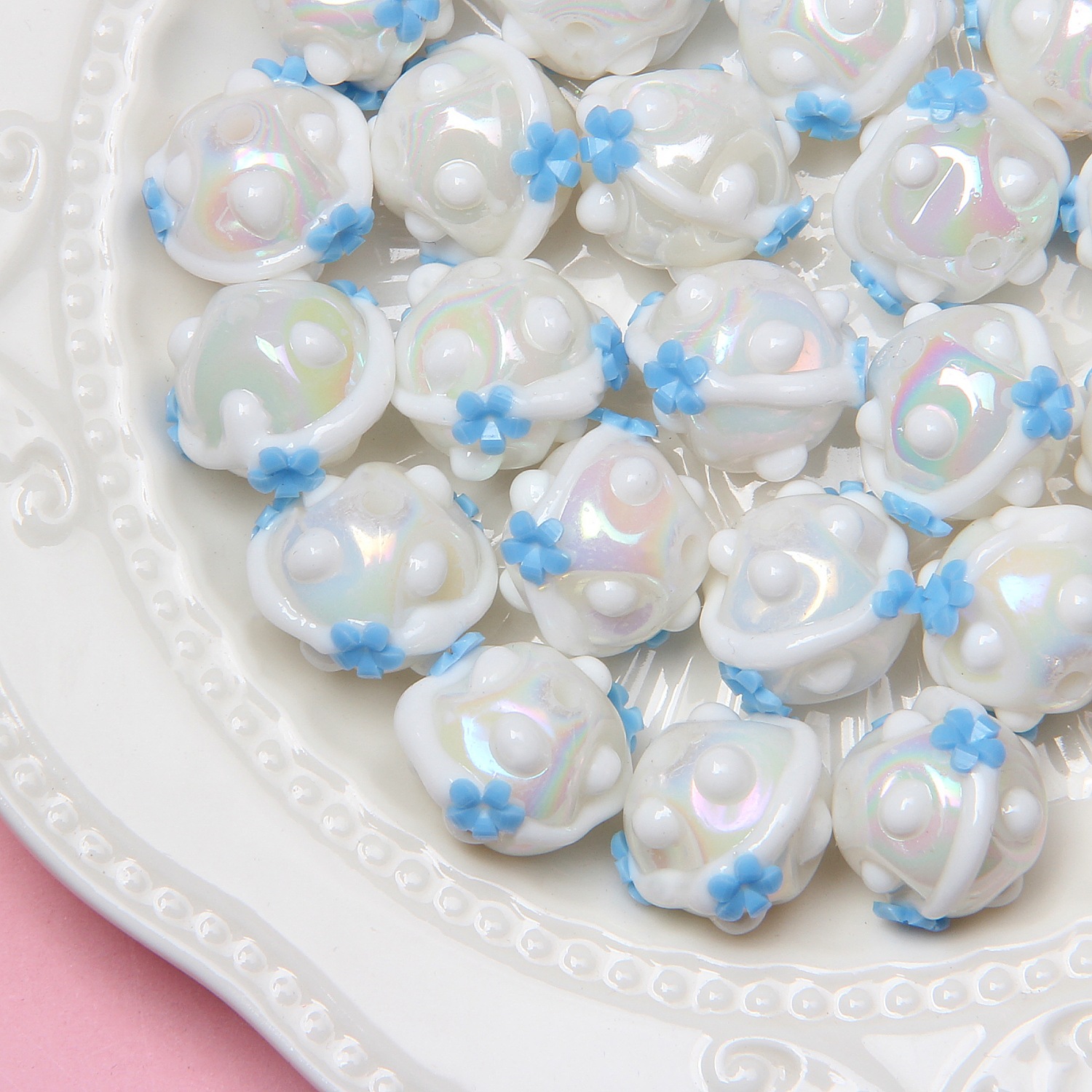 White beads and blue flowers